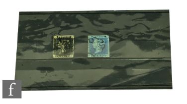 A 1d penny black and a 2d blue stamp, both with black Maltese cross cancellation marks. (2)