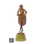 A 1930s Josef Lorenzl Art Deco cold painted model of a dancing lady leaning forward and holding up
