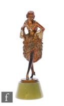 A 1930s Josef Lorenzl Art Deco cold painted model of a dancing lady leaning forward and holding up