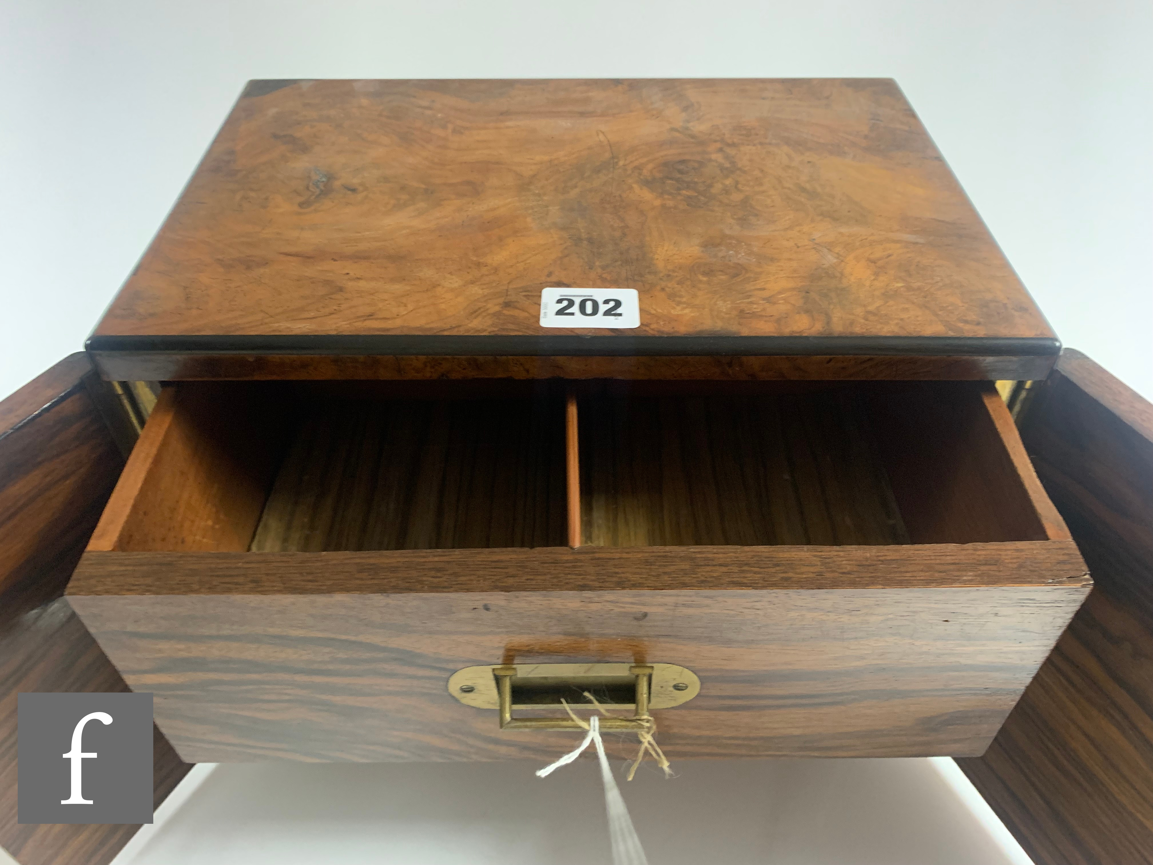 A small Victorian figured walnut table cabinet fitted with two drawers enclosed by a pair of - Image 3 of 6