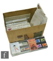 A large collection of presentation packs and FDC stamps from 1969 to 1998, in two boxes. (2)