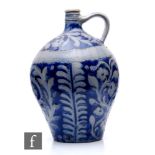 A large German 19th Century Westerwald stoneware flagon, with incised fern and botanical designs,