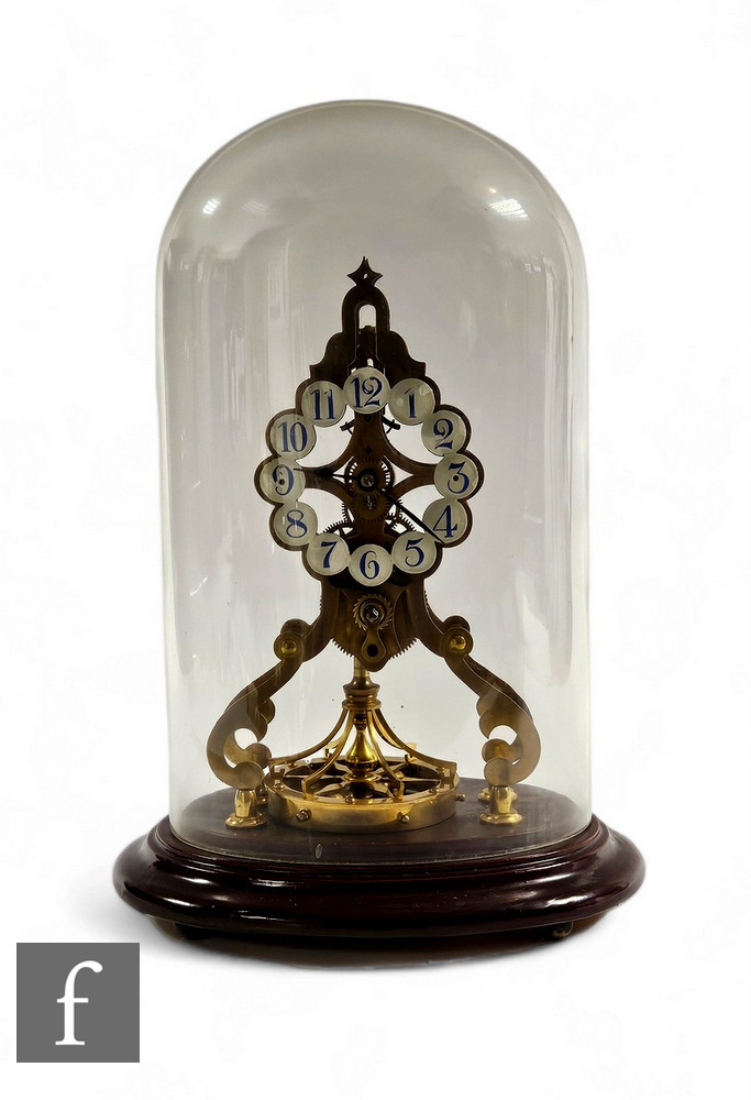 An early 20th Century brass skeleton clock by Gustave Becker, enamelled dial, circular platform