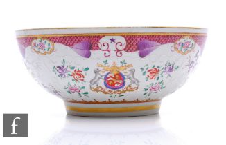 A Samson Armorial punch bowl, of circular form with famille rose decoration and central en grisaille