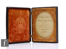 A mid 19th Century Daguerreotype photograph case, plush lines and gilt frame interior enclosed by an