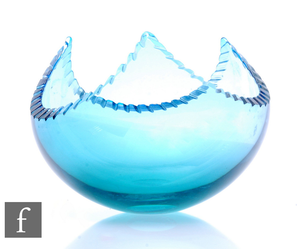 A contemporary Graham Muir studio glass bowl, the triform pulled circular bowl with notch cut rim