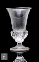 An 18th Century jelly glass circa 1750, the flared bowl with deep gadrooned base above a shallow
