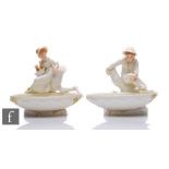 A pair of Royal Worcester sweetmeat dishes modelled by James Hadley, one dated 1884, the two figures