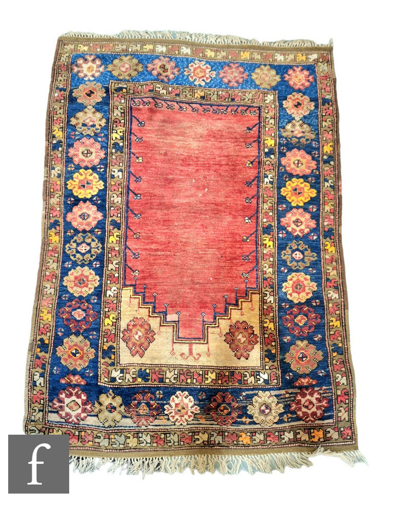 An early to mid 20th Century Turkish Karacadag woven wool rug, the central salmon pink panel