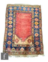 An early to mid 20th Century Turkish Karacadag woven wool rug, the central salmon pink panel