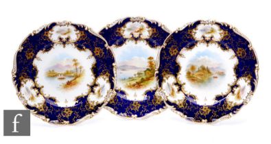 A collection of early 20th Century Coalport Scottish landscape porcelain cabinet plates, painted
