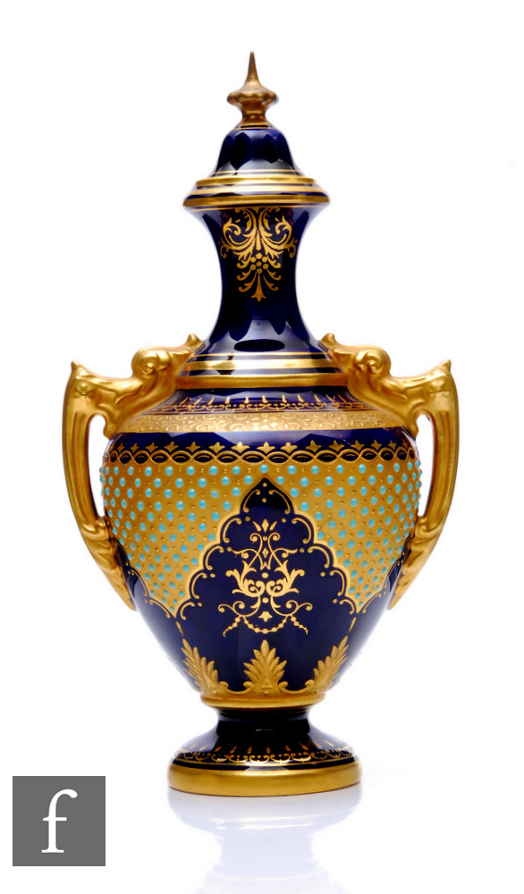 A Coalport porcelain 'Jewelled' vase and cover, circa 1900, the spreading circular foot rising to