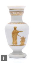 A 19th Century white opaline glass vase of footed, shouldered ovoid form with collar neck and flared