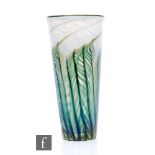 A contemporary Lundberg Studios glass vase, of tapering sleeve form, decorated with pulled opal