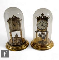 A early 20th Century brass 365 day mantle clock, Arabic circular dial, in glass dome on stepped