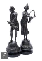 A pair of 19th Century French spelter figures of a lady with a basket and her suitor with a