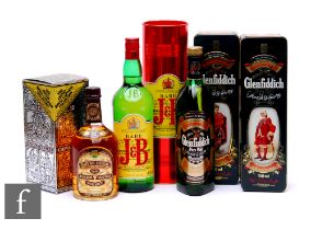 A 1 litre bottle of J&B blended whisky, two bottles of Glenfiddich in presentation cases and a