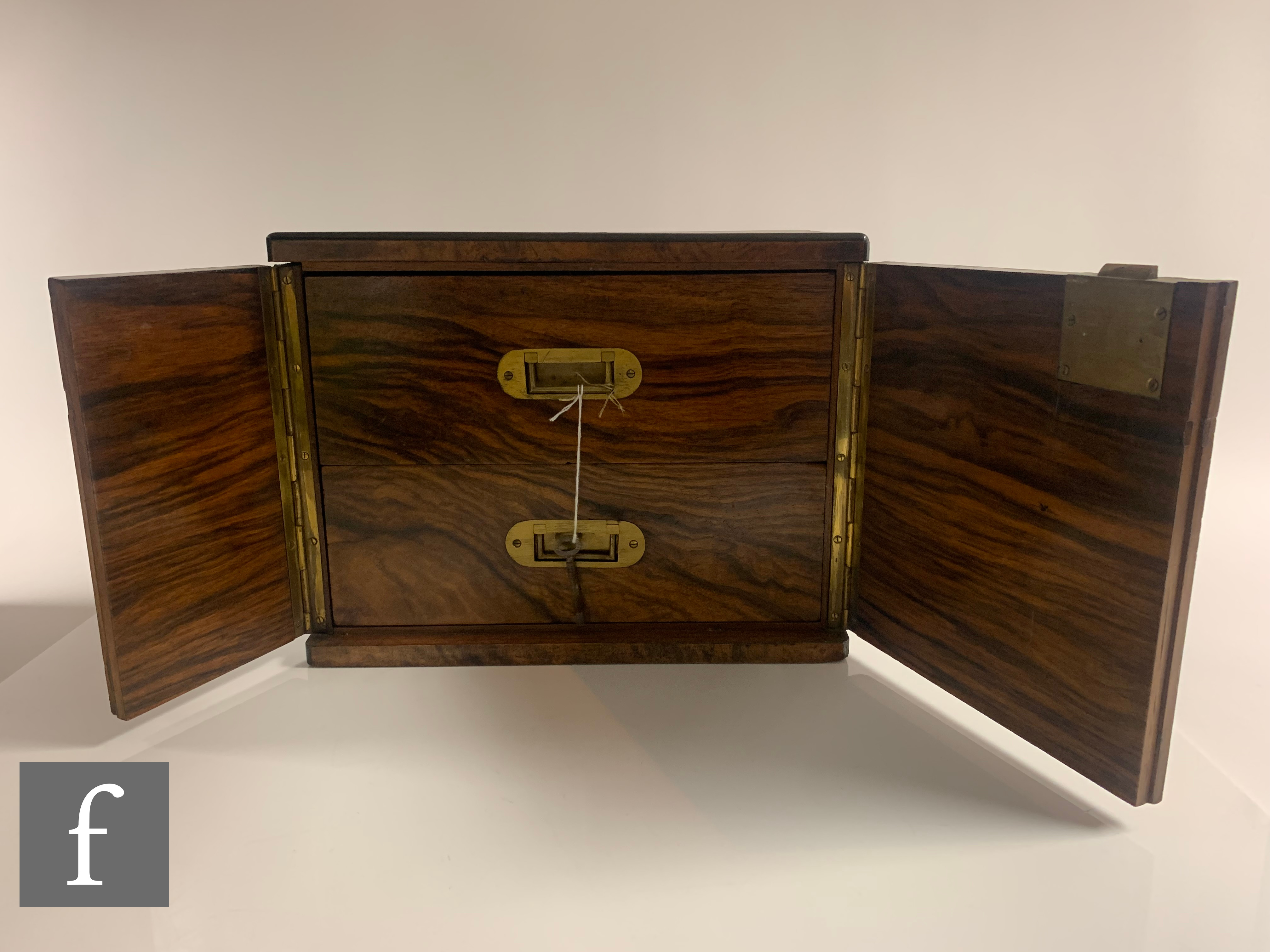 A small Victorian figured walnut table cabinet fitted with two drawers enclosed by a pair of - Image 2 of 6