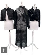 A collection of Victorian and later garments, to include a black satin cape/mourning cape, the