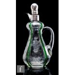 A 20th Century clear crystal glass decanter, of high shouldered and ovoid form, with applied loop