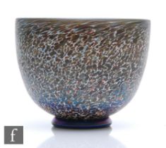 A later 20th Century Kosta Boda bowl designed by Bertil Vallien, of footed ovoid form, decorated
