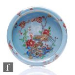 A Carlton Ware lustre bowl of circular form with folded rim, the central field painted with a