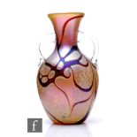 A contemporary Richard P. Golding studio glass vase, of ovoid form with flared neck and applied