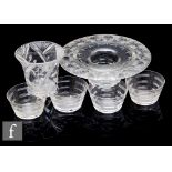 A large 1930s Stuart & Sons clear cut crystal glass bowl of footed ovoid form with wide flat rim,