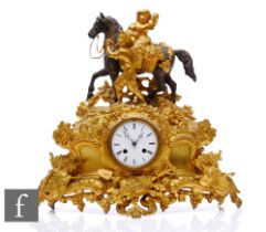 A French 19th Century Japy Freres gilt metal mantle clock, cast with fruiting vines, and