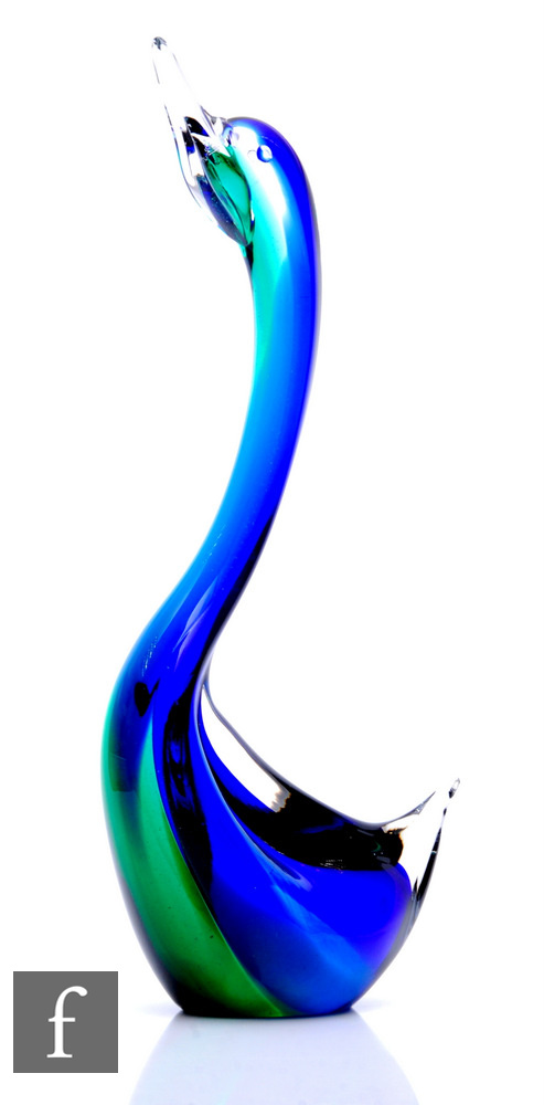 A 20th Century Murano large glass figure formed as a stylised swan, decorated internally in deep