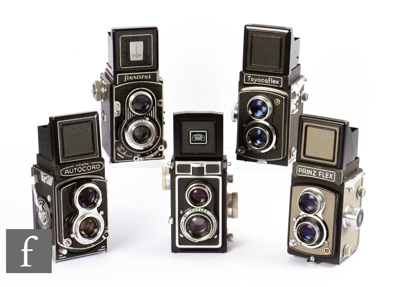 A collection of various TLR cameras, to include a Flexaret, Minolta Autocord, Ikoflex, Toyocaflex