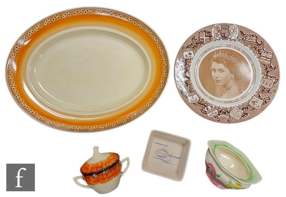 A small collection of Clarice Cliff ceramic items, comprising a Wilkinson square dish decorated with