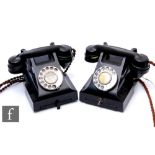 An early to mid 20th Century black Bakelite cradle telephone No 56 and a similar later model. (2)