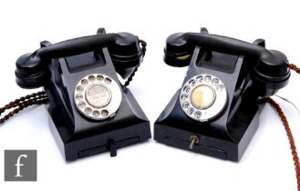 An early to mid 20th Century black Bakelite cradle telephone No 56 and a similar later model. (2)