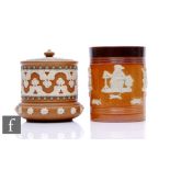 Two Doulton stoneware tobacco jars and covers, each decorated with relief moulded figural and floral