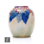 A small 1930s Royal Doulton Art Deco pottery vase of ovoid form, relief moulded with flowers and