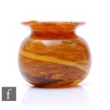 A contemporary Alum Bay studio glass vase of globe form with everted rim, tonal brown swirls over