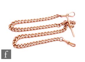 A 9ct gold curb link Albert chain, terminating in T bar and end swivels, all links stamped, length