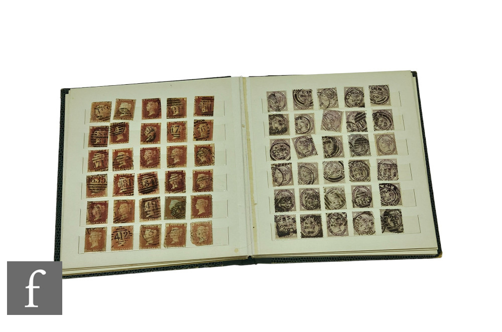 A small stock book of Queen Victoria 1d imperforated penny red stamps, stars and plates including an