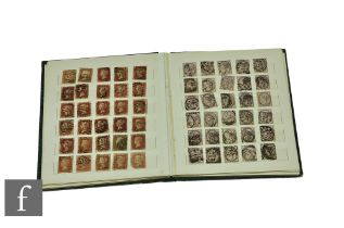 A small stock book of Queen Victoria 1d imperforated penny red stamps, stars and plates including an