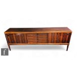 A Danish rosewood  veneered sideboard, by W Klein for Bramin Mobler, fitted with a central bank of