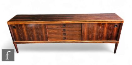 A Danish rosewood  veneered sideboard, by W Klein for Bramin Mobler, fitted with a central bank of