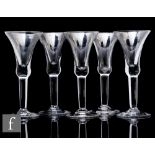 A set of five 20th Century drinking glasses in the 18th Century taste, each with flared trumpet bowl