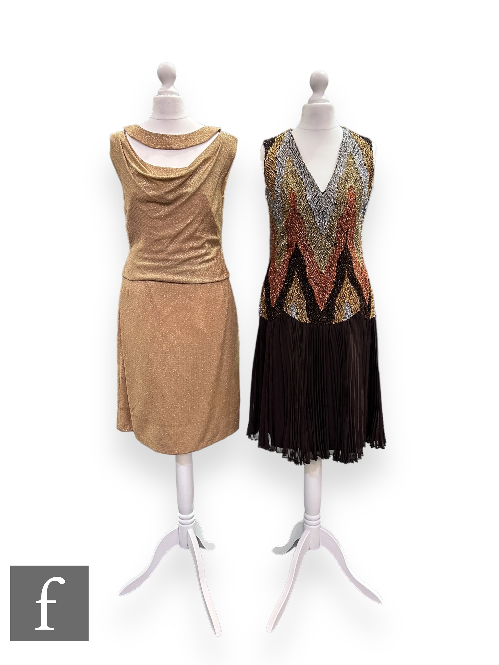 A 1960s vintage cocktail dress, the bodice with V neck and repeat chevron in metallic silver,