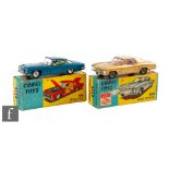 Two Corgi Toys diecast model cars, 241 Ghia L.6.4 in blue body with red interior and dog figure, and