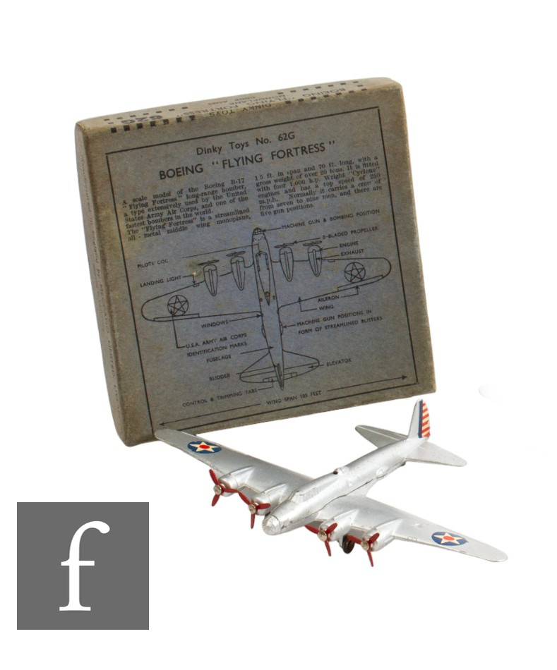 A Dinky 62G Pre-war Boeing Flying Fortress, finished in silver, white, red and blue star decals,