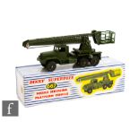 A Dinky military 667 Missile Servicing Platform Vehicle, military green including Supertoy hubs with