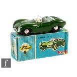 A Triang Spot-On 107 Jaguar XKSS in green with grey interior and tonneau, boxed.