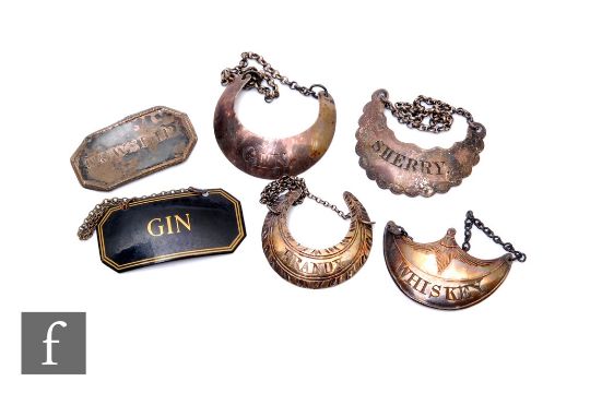 A small collection of 19th Century spirit labels to include crescent and shield shaped examples,