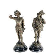 A bronzed metal Figure of "Don Juan," wearing a plumed hat and brandishing a sword and another "